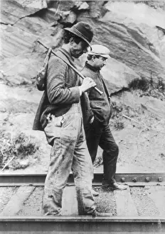 Train Tracks Prints: Two hobos walking along railroad tracks