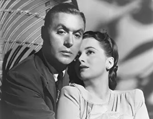 Images Dated 17th July 2015: HOLD BACK THE DAWN, from left: Charles Boyer, Olivia de Havilland, 1941