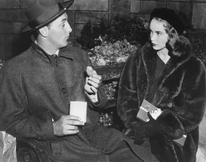 Images Dated 12th February 2016: HOLIDAY AFFAIR, from left: Robert Mitchum, Janet Leigh, 1949