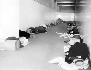 Economic Crisis Prints: Homeless people hiding from a cold wave