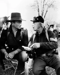Hoot Prints: THE HORSE SOLDIERS, from left, John Wayne, Hoot Gibson, on-set, 1959