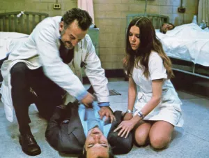 Dying Prints: THE HOSPITAL, from left, kneeling, George C. Scott, Diana Rigg, 1971