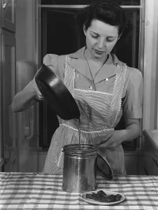 Frying Pan Prints: Housewife pouring waste fats that will be processed into ammunition for America's World War 2 military
