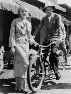 Actresses Prints: Howard Hughes 1905-1976 with actress Ida Lupino 1918-1995 in Miami Florida 1937