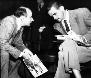 Lawyer Prints: Howard Hughes (right) confers with his counsel