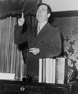 Huey Prints: Huey P. Long in a speaking pose in 1935