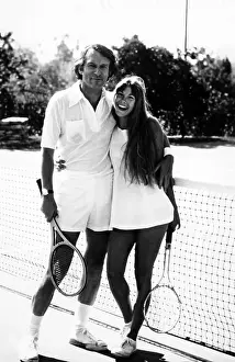 History Prints: Hugh Hefner and Barbi Benton pose for a cover shot for Tennis Magazine'