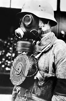 Hungary Prints: Hungarian soldier wearing a new type of gas mask with a microphone to enable conversation during a gas attack