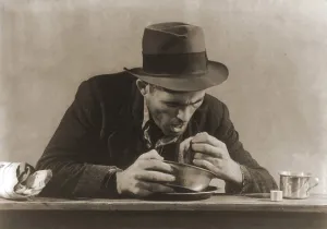 Soup Kitchen Prints: Hungry man with his meal of bread and soup at a New York City soup kitchen during the Great Depression