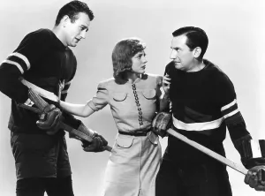 Sheila Prints: IDOL OF THE CROWDS, from left, John Wayne, Sheila Bromley, Hal Neiman, 1937