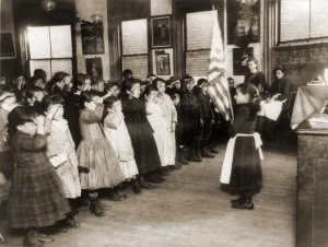 Assimilation Prints: Immigrant children saluting the flag in the Mott Street Industrial School