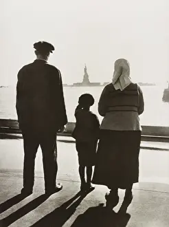 Emigration Prints: Immigrant family views the Statue of Liberty from the Ellis Island