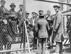 Halftone Prints: Immigration. Failed immigrants awaiting deportation on the roof of the main building at Ellis Island