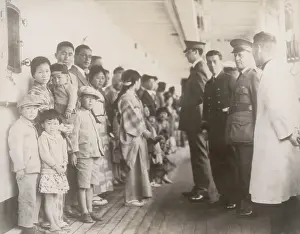 Families Prints: Immigration officials examining Japanese passengers aboard the ship Shimyo Maru