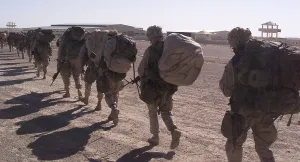 Images Dated 16th March 2011: An infantry company moves past the newly seized forward operating base on Nov