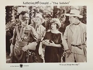 Turban Prints: THE INFIDEL, lobbycard, from left: Boris Karloff