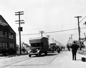 Images Dated 3rd December 2008: Integration. A convoy of African-American moving trucks protected by police cars