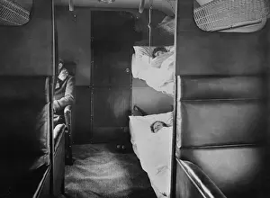 Rs3wn Prints: Interior of Junkers plane with passenger sitting in leather armchair seats