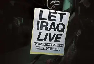 Iraqis Prints: IRAQ. Bagdad. American banner against the embargo at the bunker n
