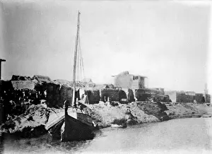 Mesopotamia Prints: Iraq, A small sail boat anchored on the shore of the Tigris River near Kut-El-Amara