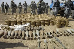 Explosives Prints: Iraqi National Police and US soldiers discover a weapons cache of 29 120-mm mortar rounds 466 2