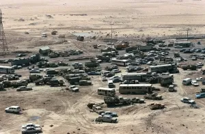 June Prints: Iraqi Vehicles damaged and abandoned along Highway 80 west of Kuwait City during Operation Desert Storm