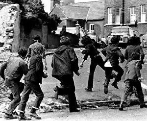 Political Prints: Irish children throwing rocks at a British armored car in Armagh