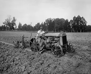 Labor Prints: Iron wheeled Fordson was powered by an internal combustion engine, c. 1925