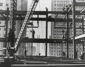 Lcgr1409 Prints: Iron workers raise steel at 32nd floor of the Esso Building in New York City