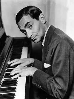 History Prints: Irving Berlin at the piano, 1940s. Courtesy: CSU Archives / Everett Collection