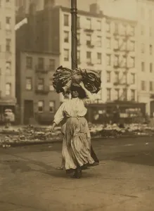 Classic Prints: Italian woman carrying heavy bundle of clothing on her head Near Astor Place