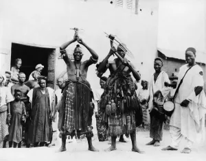 Traditional Prints: Two itinerant medicine men on a street in the village of Abeokuta