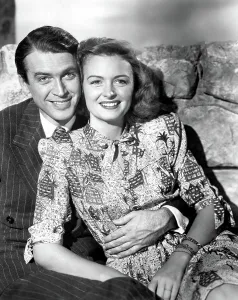 Arm Around Waist Prints: IT'S A WONDERFUL LIFE, James Stewart, Donna Reed, 1946