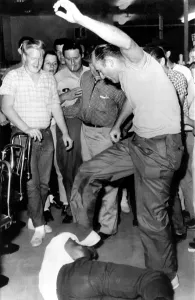 Demonstrate Prints: Jackson, Mississippi: 21-year-old Memphis Norman is beaten by a man identified as Benny Oliver