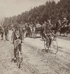 Bicycles Prints: Jacob Coxey rides in a carriage toward Washington, accompanied by bicyclists and marchers