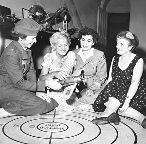 Nichols Prints: Jacqueline Cochran (2nd from left) and famous women flyers talk shop at her NYC apartment