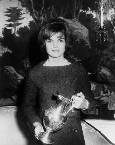 First Family Prints: Jacqueline Kennedy holds a silver pitcher presented by James Hogan Alexander