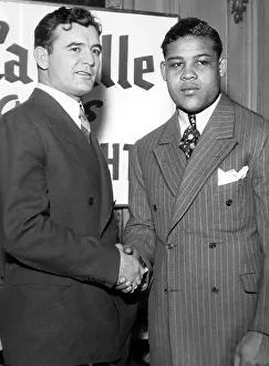 Louis Prints: James Braddock and Joe Louis shake hands after signing contract for upcoming fight in Chicago