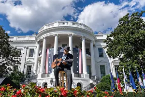 Banners Prints: James Taylor performs at the celebration for the Inflation Reduction Act on the South Lawn of the White House