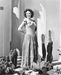 Janis Prints: Janis Carter in chiffon gown designed by Juliette Gallian, 1948