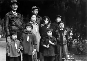 Ww Ii Prints: Japanese-American Mochida family wear identification tags while awaiting evacuation bus