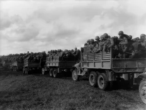 Trucks Prints: Japanese-American soldiers of the 442nd Regiment in trucks in north western France