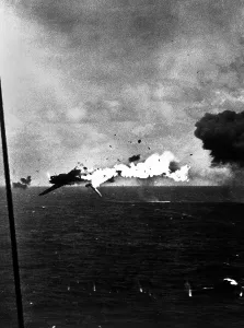 Bombers Prints: Japanese bomber explodes after direct hit by 5 inch shell from USS Yorktown