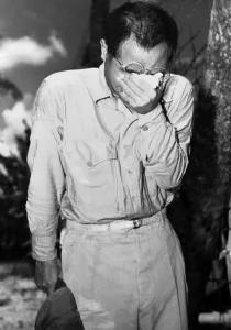 Captured Prints: Japanese POW on Guam after hearing Emperor Hirohito announce of Japan's surrender