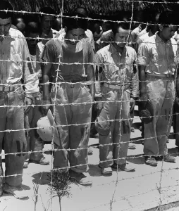 Captured Prints: Japanese POW's on Guam after hearing Emperor Hirohito announce of Japan's surrender