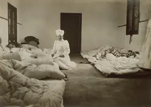 Patients Prints: Japanese Red Cross nurses at Chemulpo attending Russian soldiers wounded in battle of Feb