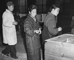 Election Prints: Japanese women cast their ballots in a polling place in Tokyo