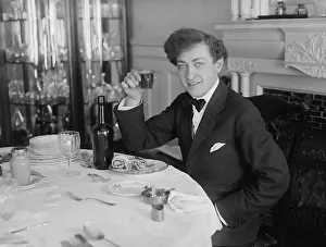 Classical Prints: Jascha Heifetz, teenage Russian born violin virtuoso at meal time in New York City