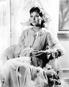 Parker Prints: Jean Parker, modeling a turquiose-blue chiffon negligee, 1935