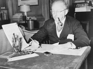 Jerome Prints: Jerome Kern (1885-1945), at desk with musical scores